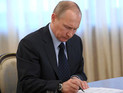 Путин подписал закон о присвоении статуса ветерана воевавшим в Сирии Путин подписал закон о присвоении статуса ветерана воевавшим в Сирии