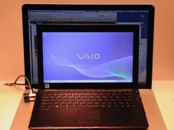 Sony VAIO X    MacBook Pro.    engadget.com